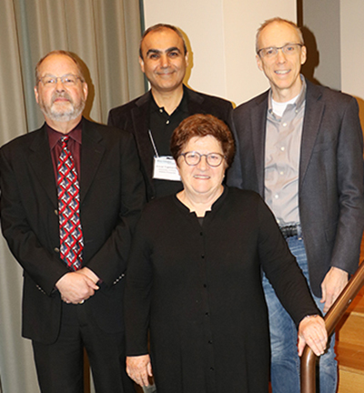 Pictured: front row, Zan Luthey-Schulten, a professor of chemistry and Schulten’s widow; back row, from left, Mark Berger, senior alliance manager for life and material sciences, NVIDIA; Emad Tajkhorshid, a professor of biochemistry and leader of the Theoretical and Computational Biophysics Group; and Jeff Moore, the director of the Beckman Institute for Advanced Science and Technology.