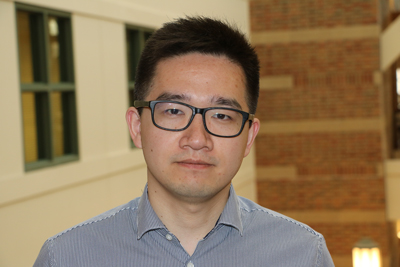 Photo of Beckman Institute Postdoctoral Fellow Xing Jiang at the institute.
