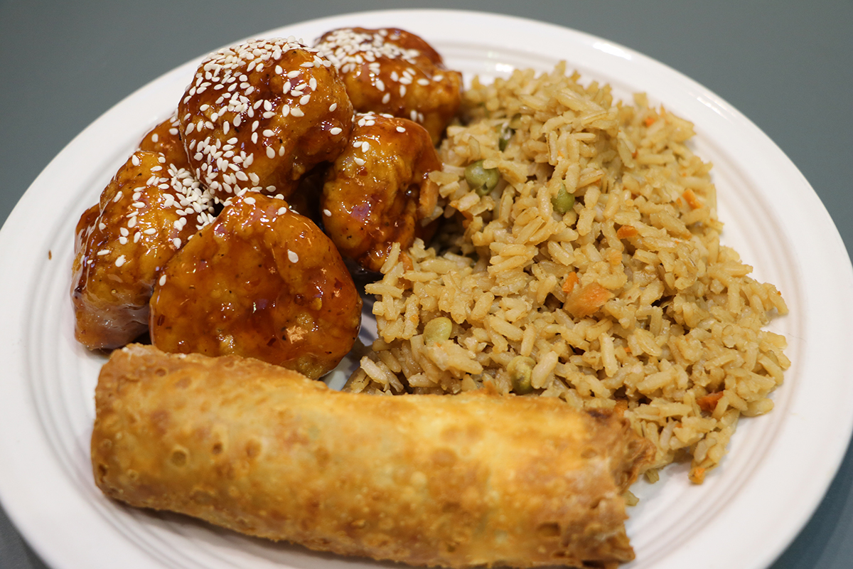 General Tso’s Chicken or Orange Chicken with White Rice and Eggrolls