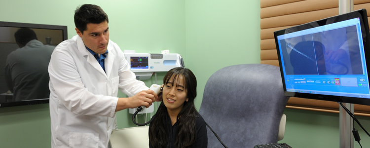 Graduate students in the Bioimaging Science and Technology Group demonstrate what a doctor’s office in the future might be like.