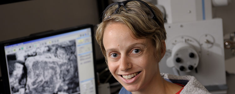 Elizabeth Jones uses the scanning electron microscope (SEM) to characterize the homogeneity of electrodes used in high-capacity lithium-ion batteries. During charge and discharge cycles of the batteries, the electrodes expand and contract; if they expand too much, they crack and diminish the integrity of the battery. Jones is perfecting an electrode that delivers high-capacity energy without cracking.