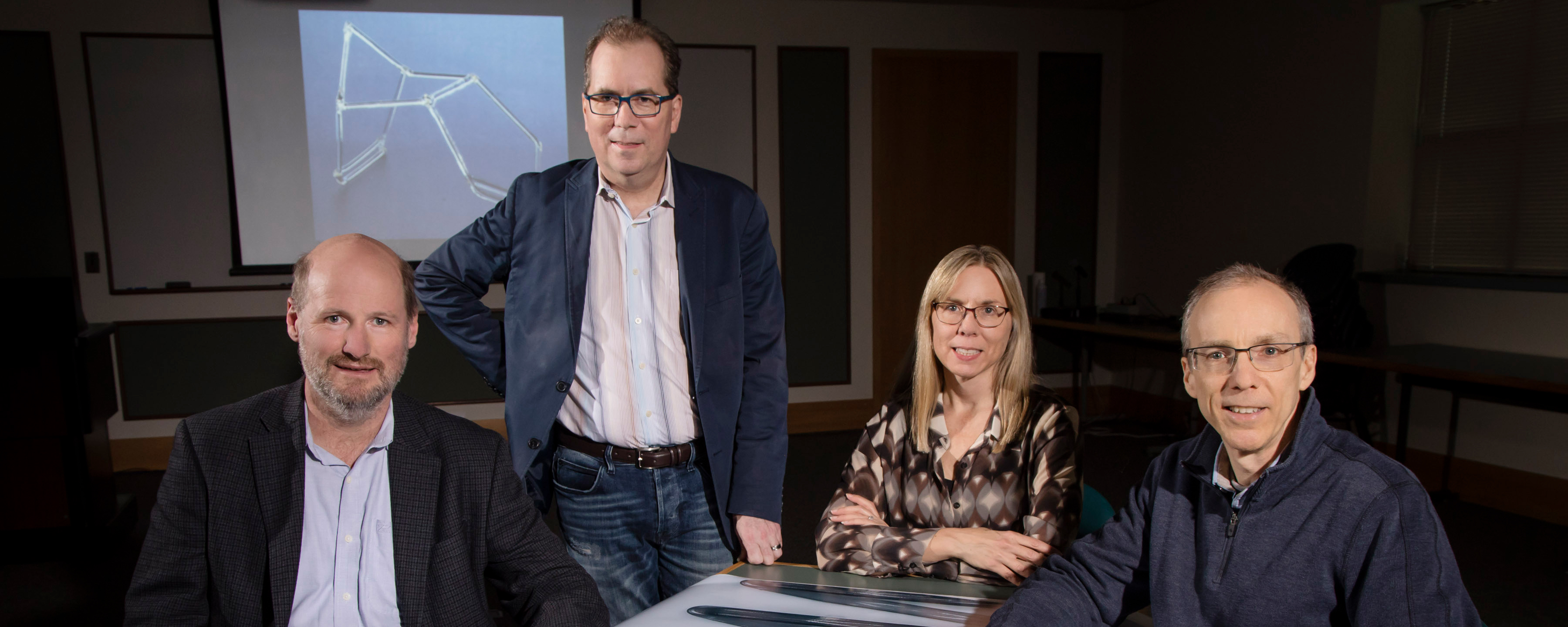 From left, Philippe Geubelle and Scott White, both professors of aerospace engineering; Nancy Sottos, a professor of materials science and engineering; and Jeff Moore, a professor of chemistry and the director of the Beckman Institute. All are members of Beckman’s Autonomous Materials Systems Group.