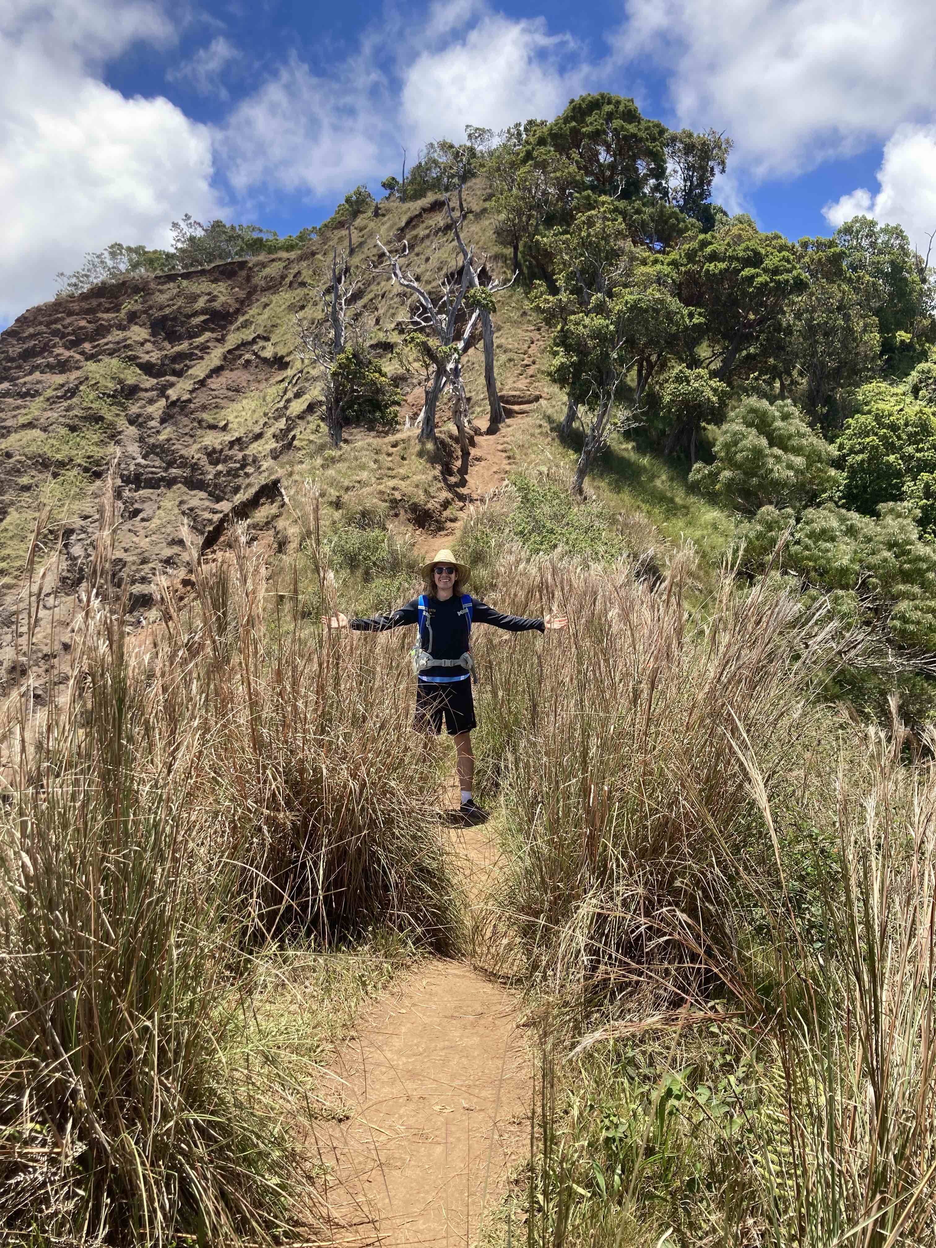 Kevin Clark hiking a mountain in Kalalau.