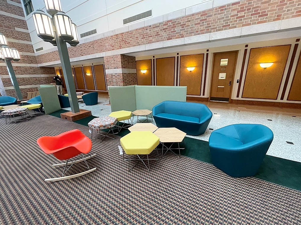 A photo of the Beckman Atrium's new furniture, which includes highly interactive elements like chairs that spin and rock.