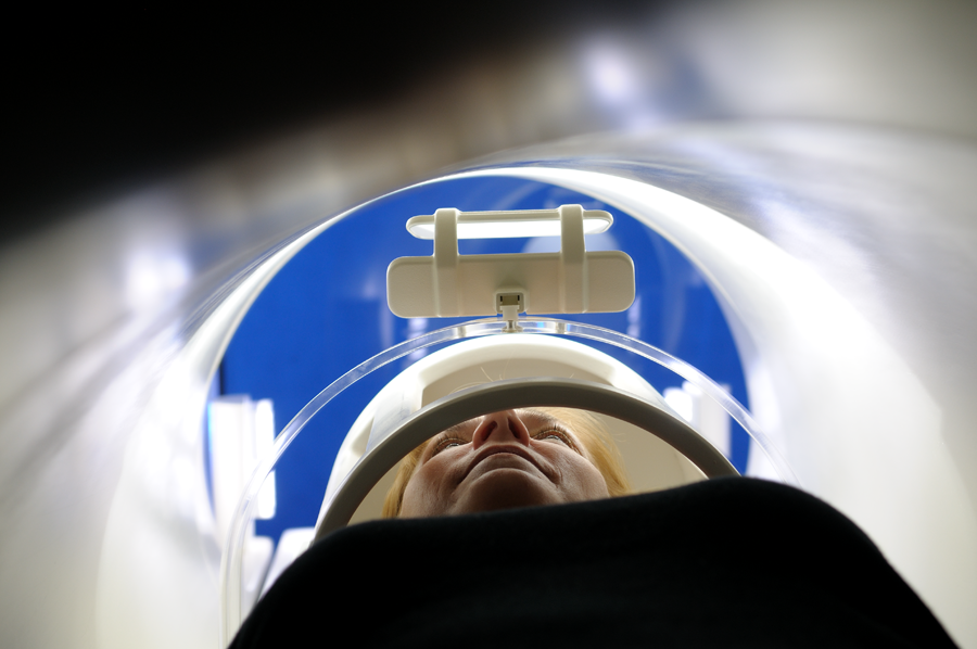Woman in a MRI body scanner