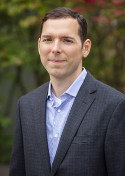 A portrait photo of neuroscientist Aron Barbey.