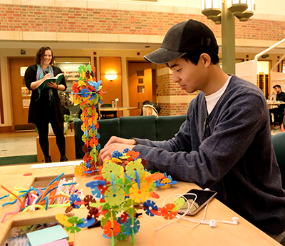  For her project, Henderson re-imagined the central area of the Beckman atrium, including the addition of several tables with interactive items.