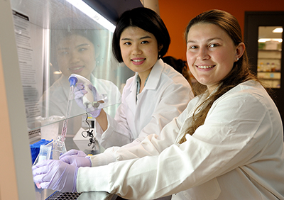 During the 10-week Research Experience for Undergraduates, Cheri Fang, left, a first-year Ph.D. student in bioengineering, served as a graduate student mentor for Amanda Craine, a junior in biomedical engineering at Pennsylvania State University.