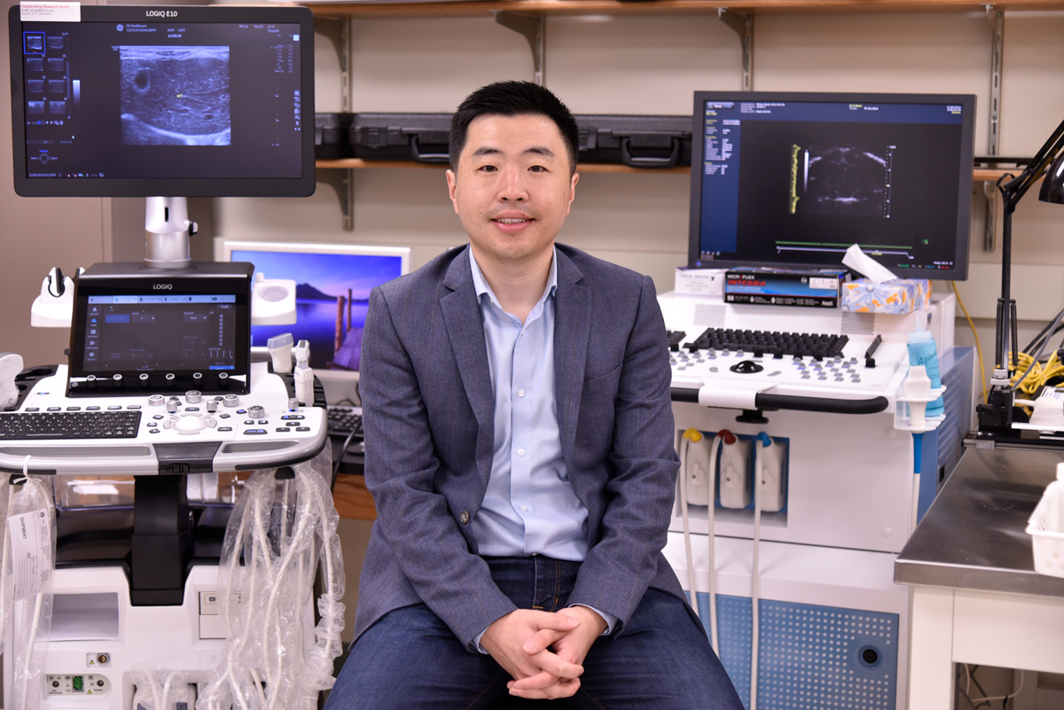 Pengfei Song in his lab