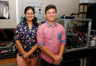 Shachi Mittal, a Beckman Institute Graduate Fellow, (left), and Juan Munoz, a junior in biomedical engineering at Mercer University