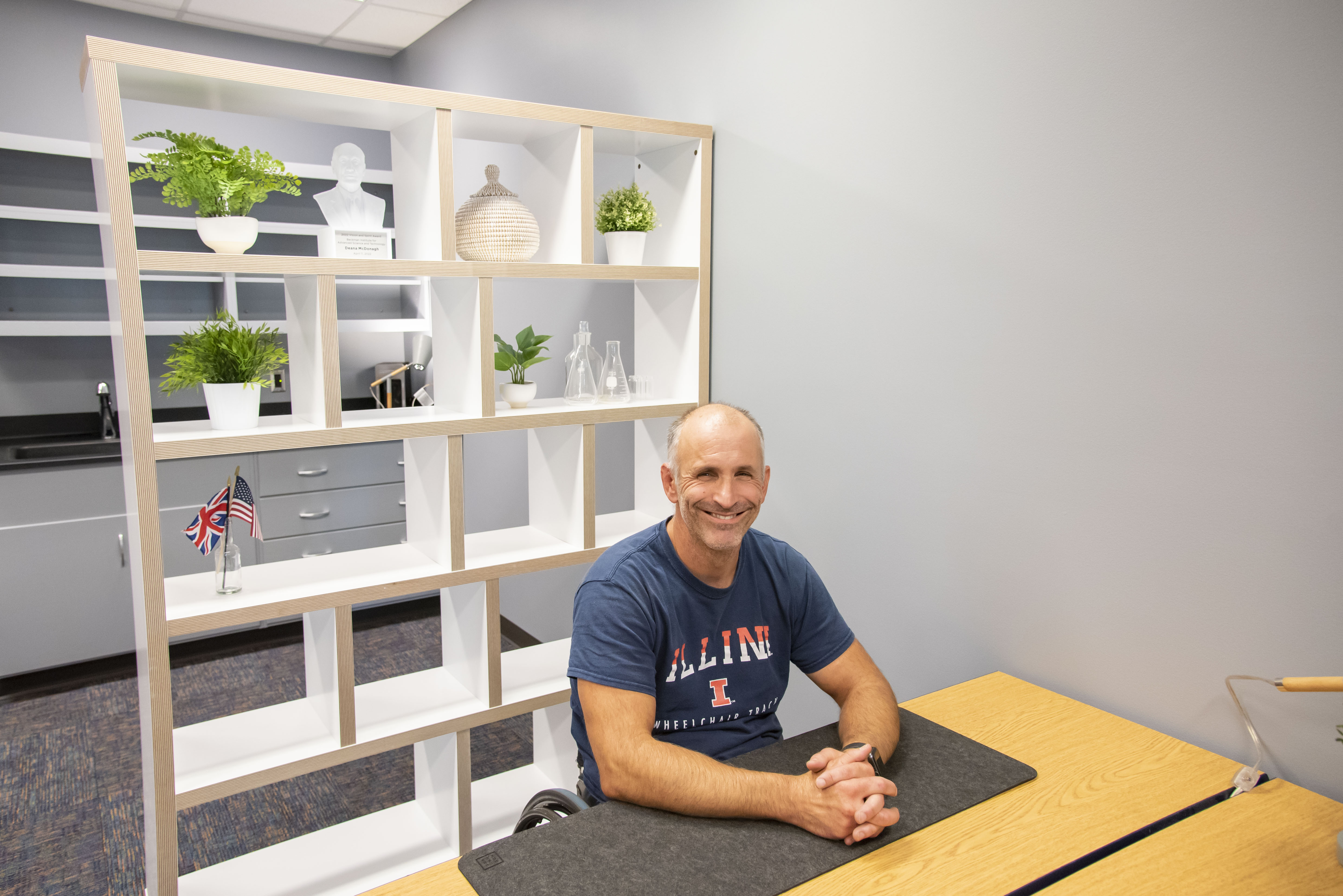 Adam Bleakney at his workspace in the (dis)Ability Design Studio