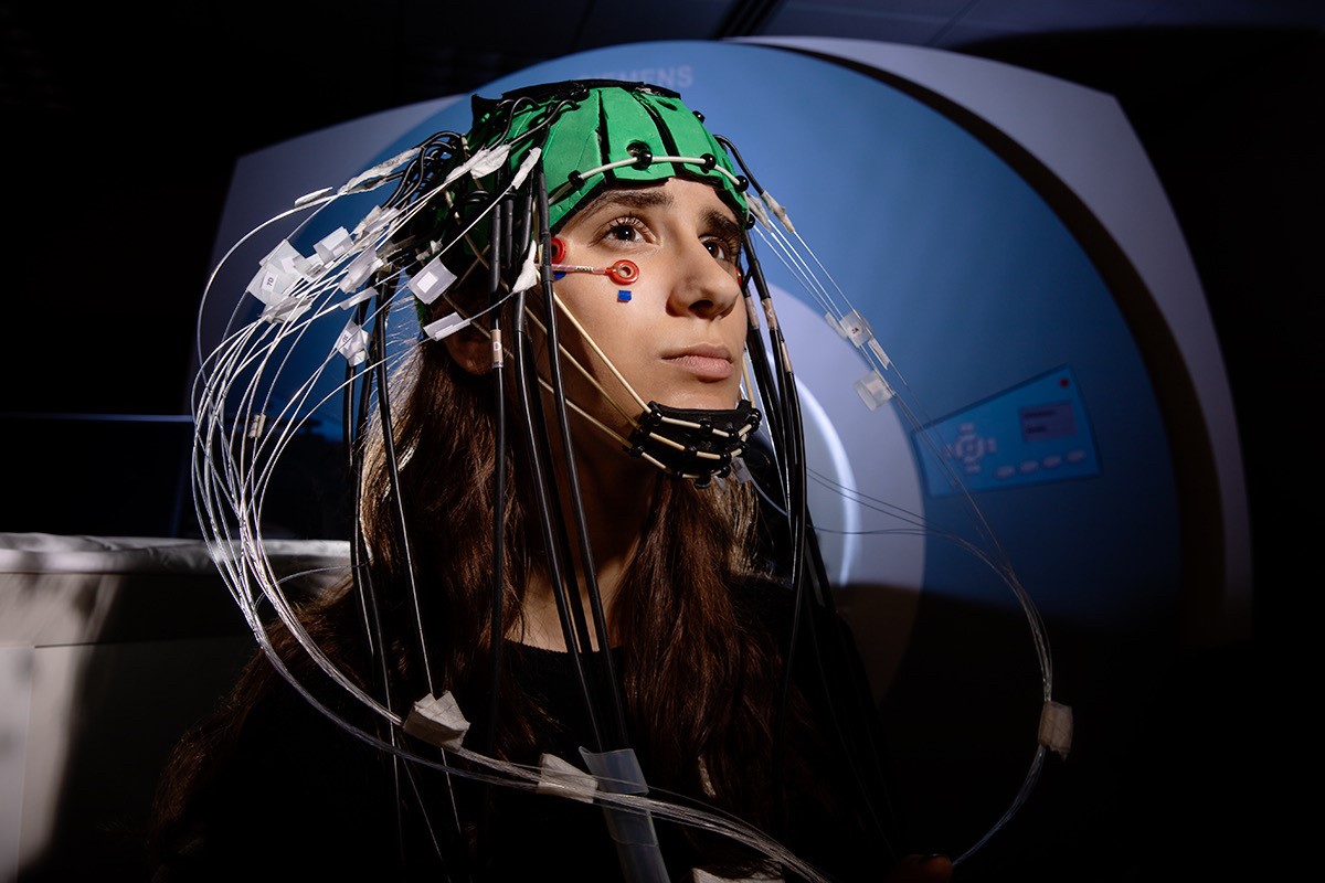 Julia Radu hooked up to an optical brain imaging tool