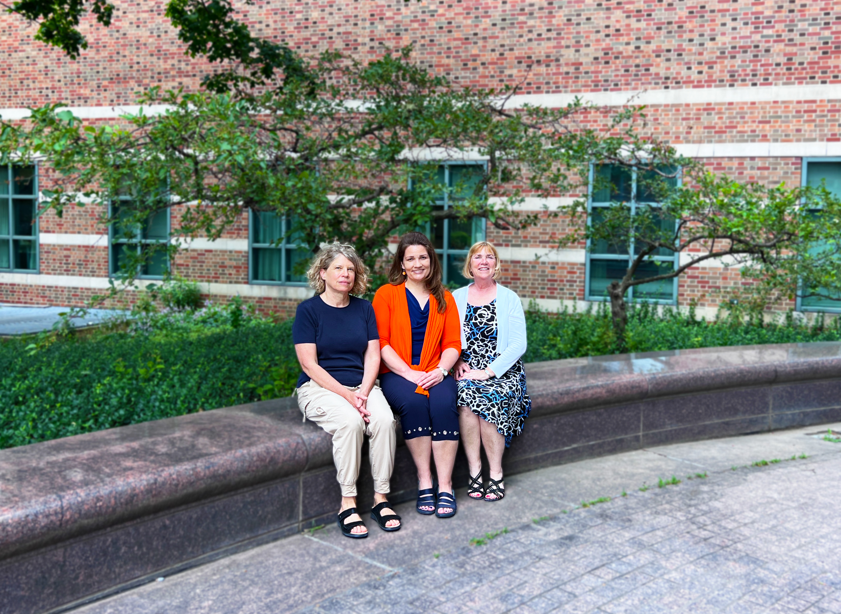 Stephanie Ceman, Laura Hetrick and Tracey Wszalek outside the Beckman Institute.