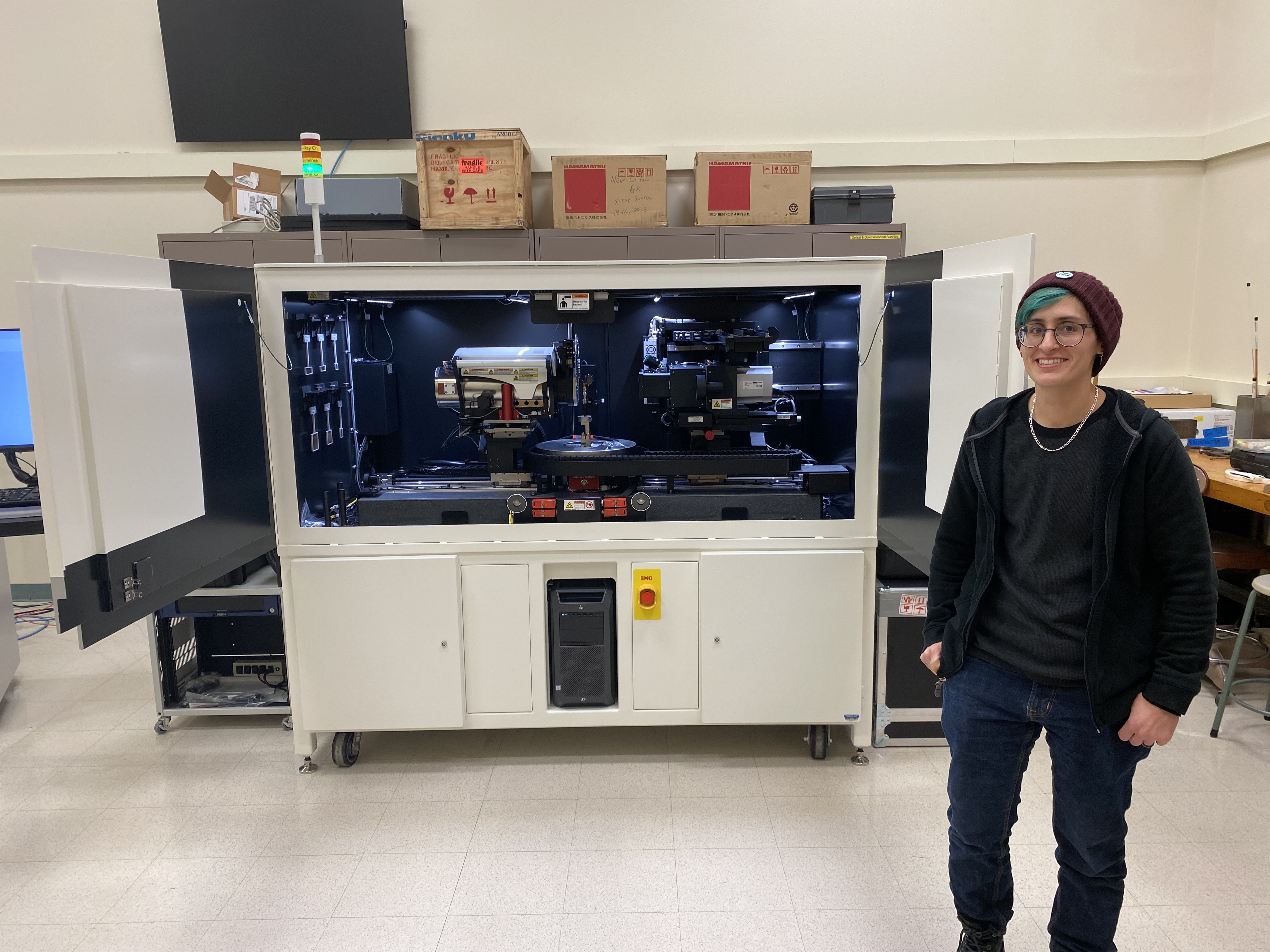 Beckman microscopist T. Josek stands next to the new Zeiss Xradia 630 Versa micro-CT scanner, which is located in the institute's Microscopy Suite. 